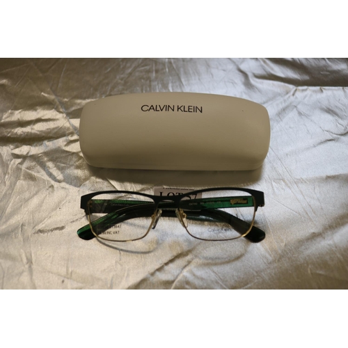 57 - PAIR OF LADIES CALVIN KLEIN SPECTACLE FRAMES WITH CASE