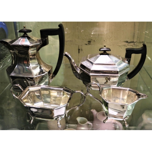 411 - A SILVER PLATED TEA SET COMPRISING TEAPOT, COFFEE POT, CREAM AND SUGAR BOWLS