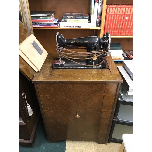224 - ELECTRIC SINGER CABINET SEWING MACHINE WITH  ACCESSORIES