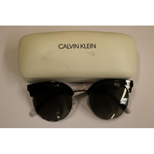 50 - LADIES CALVIN KLEIN SUNGLASSES WITH DECORATIVE ARMS - ORIGINAL CASE