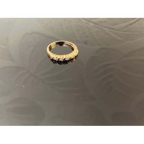 379 - 9CT GOLD RING SET WITH 5 DIAMONDS