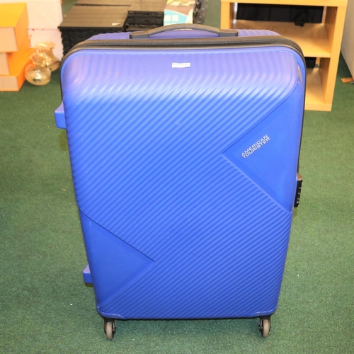 154 - LARGE BLUE AMERICAN TOURISTER ROLLING SUITCASE