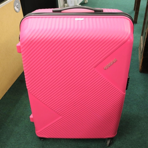 155 - LARGE PINK AMERICAN TOURISTER ROLLING SUITCASE