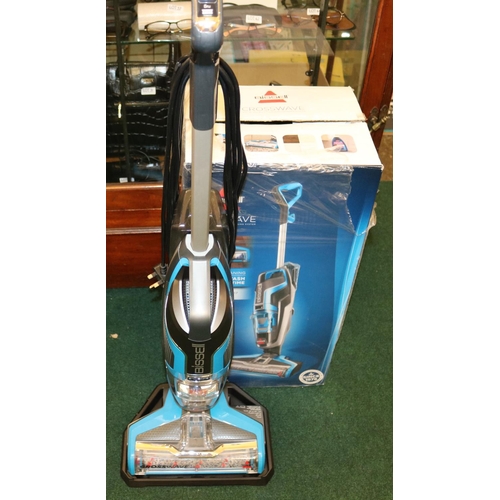 77 - BOXED BISSELL CROSS WAVE VACUUM/WASH SYSTEM WITH STAND