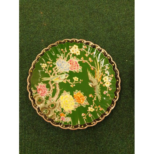 256 - A PAIR OF HIGHLY COLOURED CHINESE VINTAGE SCALLOPED PLATES SHOWING BIRDS OF PARADISE, ONE IN FAMILLE... 