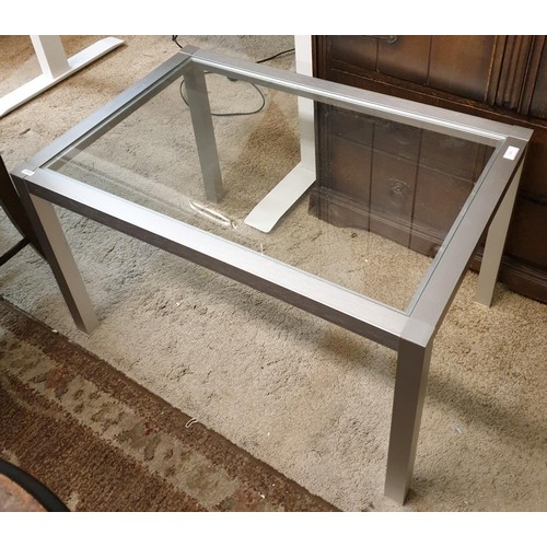 335 - A BRUSHED CHROME AND GLASS COFFEE TABLE - 20.5