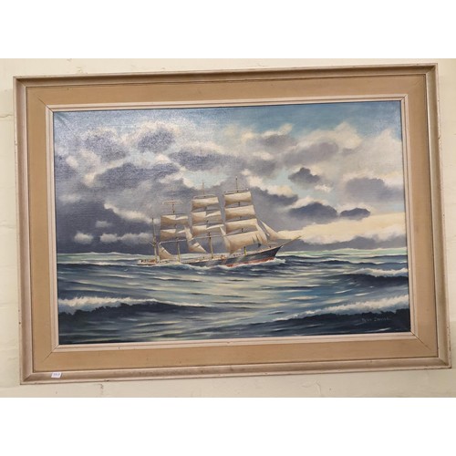 353 - A FRAMED PICTURE A SAILING SHIP IN HEAVY SEAS, SIGNED PETER DAVIES