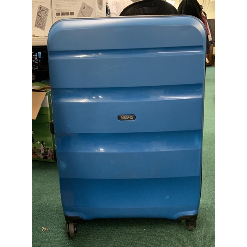 134 - AMERICAN TOURISTER HARD SHELL SUITCASE PALE BLUE - WELL USED