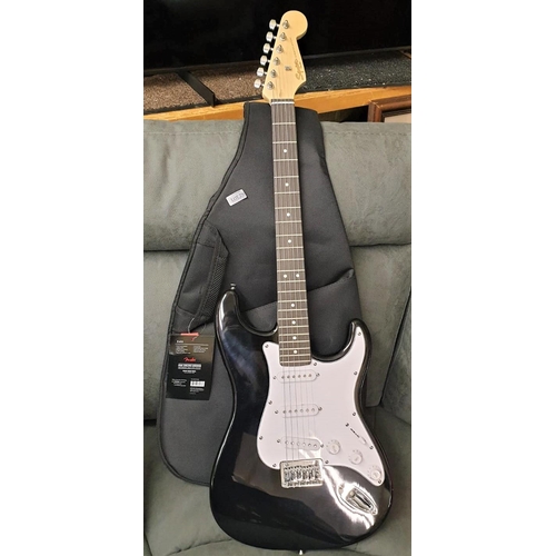 256 - FENDER F405 SQUIER STRATOCASTER ELECTRIC GUITAR IN CARRY CASE BLACK