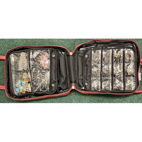 503 - PREZERVE JEWELLERY PORTFOLIO CASE WITH A HUGE QTY OF COSTUME JEWELLERY, INC. BRACELETS, EAR RINGS ET... 