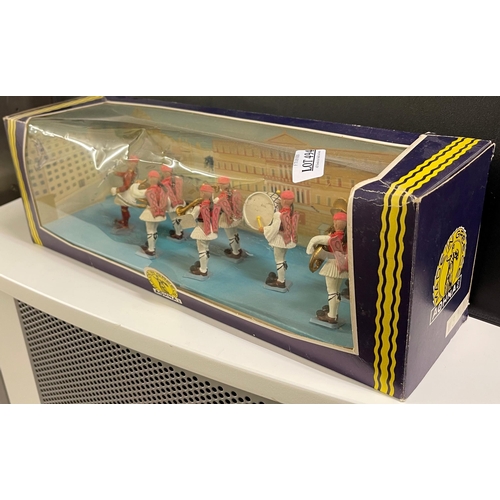 494 - BOXED MODEL FIGURINES OF A GREEK MILITARY BAND IN GREEN DRESS