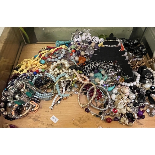 515 - SHELF AND A HALF OF COSTUME JEWELLERY - NECKLACES, BANGLES ETC