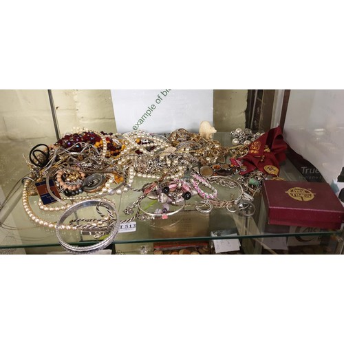 513 - SHELF OF COSTUME JEWELLERY ETCBANGLES, BEADS ,NECKLACES ETC.