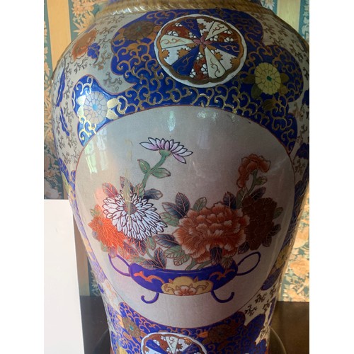 249 - A PAIR OF CHINESE PEONY PATTERN VASES WITH BLUE AND GOLD PATTERN AND A CENTRAL CARTOUCHE BEARING FLO... 