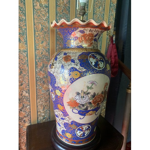 249A - A PAIR OF CHINESE PEONY PATTERN VASES WITH BLUE AND GOLD PATTERN AND A CENTRAL CARTOUCHE BEARING FLO... 