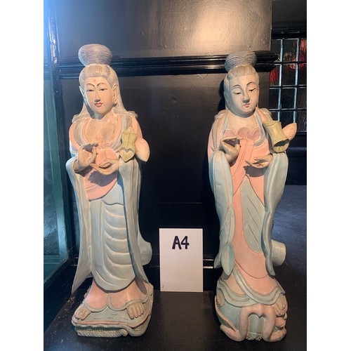 252 - A PAIR OF CARVED CHINESE FIGURINES IN PINK & GREEN - APPROX. 104CM H X 28CM W