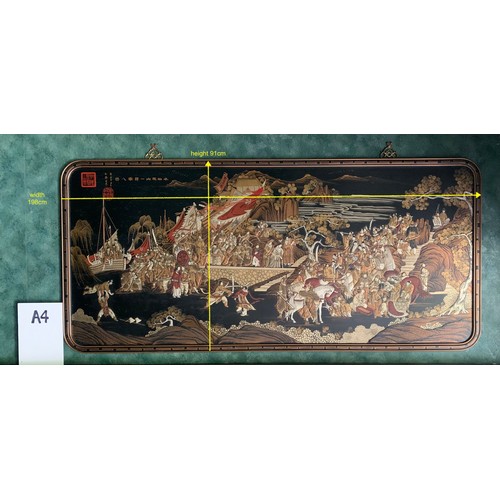 256 - A LARGE CHINESE RECTANGULAR DIORAMA IN BLACK & GOLD OF A BATTLE SCENE -SHOWING AN ARMY BESIEGING A C... 