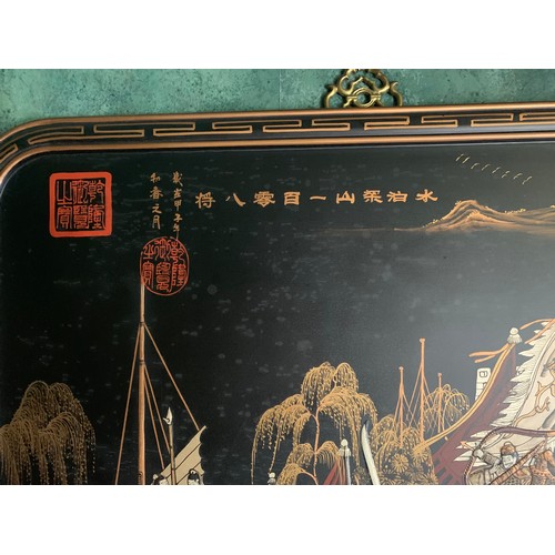 256 - A LARGE CHINESE RECTANGULAR DIORAMA IN BLACK & GOLD OF A BATTLE SCENE -SHOWING AN ARMY BESIEGING A C... 