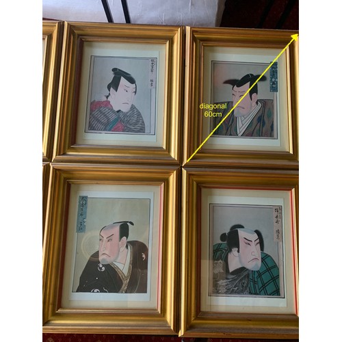 261 - A set of 8 Japanese Warrior Face Prints in gold frames