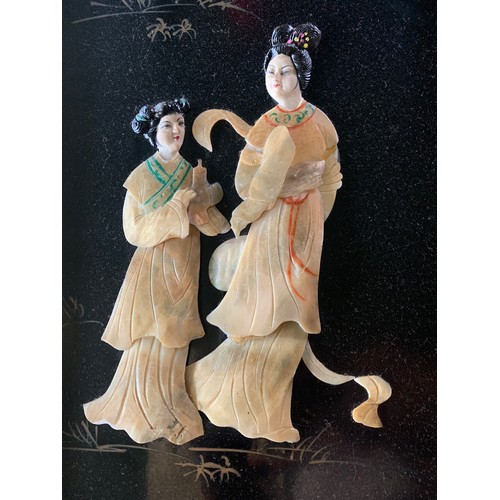 265 - A set of 2 Chinese hanging panels depicting Ladies by a pagoda temple,  - black lacquered with mothe... 