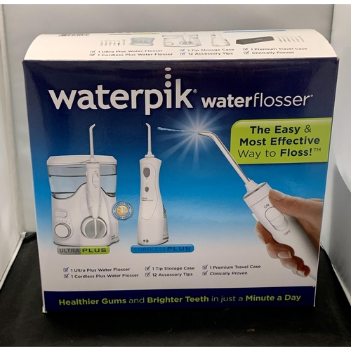 2 - BOXED WATERPIK WATER FLOSSER