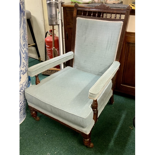 224 - A STAINED AS MAHOGANY LOW ARMCHAIR, VICTORIAN, CIRCA 1870, WITH A MOULDED FRAME, A BALUSTRADE GALLER... 