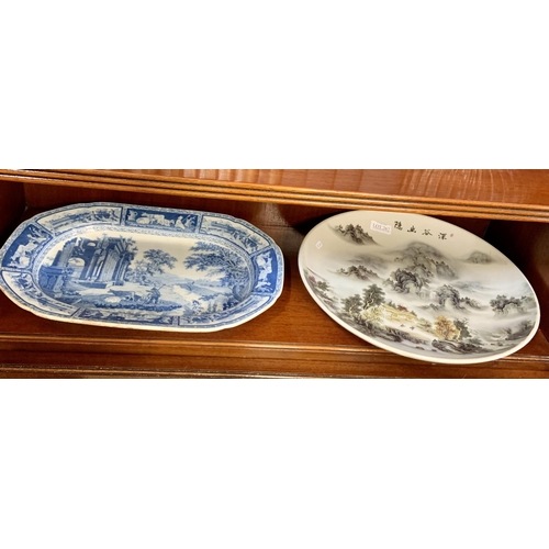 267 - A ORIENTAL PLATE DEPICTING MOUNTAINS SCENES 33.5CM WIDE WITH MARK TO BACK TOGETHER WITH WILLOW WARE ... 