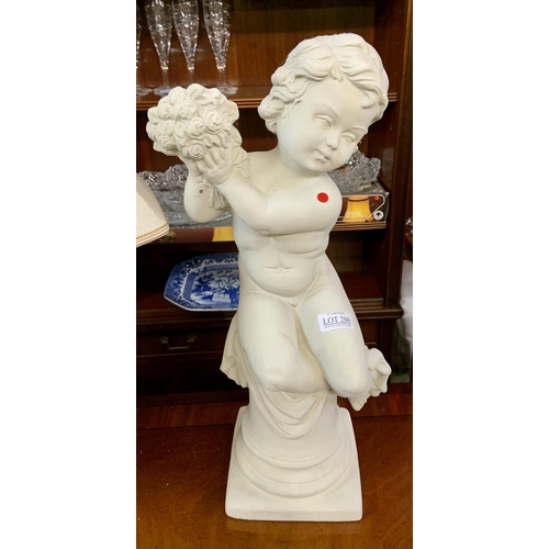 286 - PLASTER CAST STATUE OF A CHERUB HOLDING FLOWERS (SMALL CHIP TO BASE)