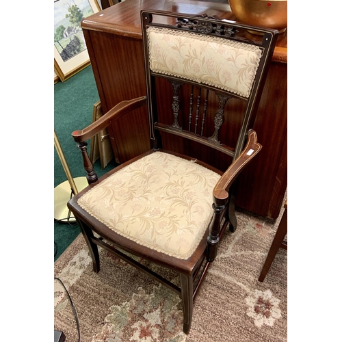 297 - UPHOLSTERED CARVED BACKED BEDROOM CHAIR (DGE TO ONE ARM)