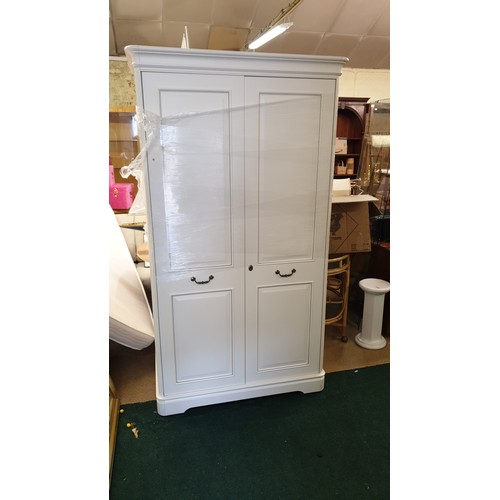 217 - OLYMPUS TWO DOOR WHITE WARDROBE 196CM X 110CM X 64CM WITH KEY (TO MATCH LOT 216)