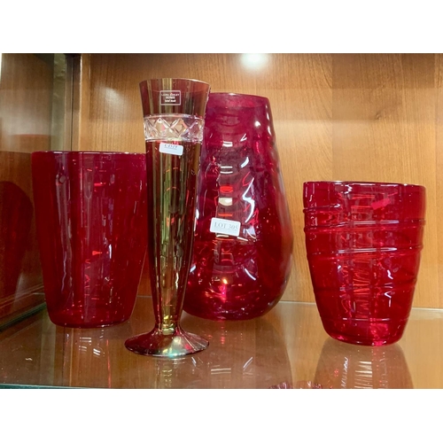 305 - THREE CRANBERRY GLASS VASES TOGETHER WITH A LAURA ASHLEY VASE