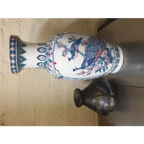 318 - LARGE ORIENTAL STYLE VASE SHOWING PEACOCKS WITH A SMALL BALLUSTER VASE