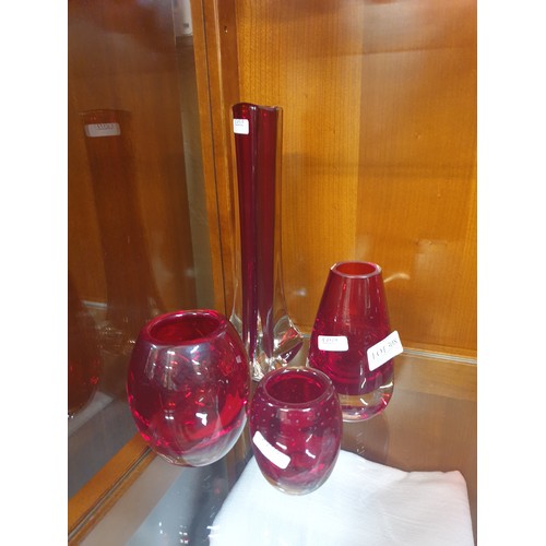 308 - FOUR VARIOUS CRANBERRY GLASS SMALL VASES