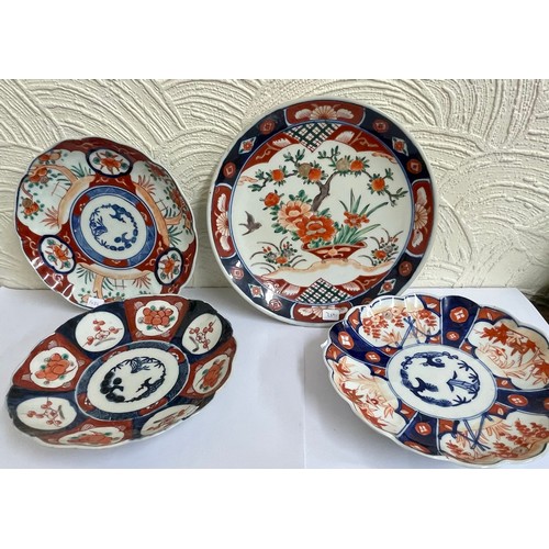 390 - Four Japanese Imari plates, three early 20th century one mid 20th century 22cm D one 25cm D porcelai... 