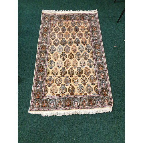 280 - A PAIR OF INDIAN RUGS, TAJ MAHAL AND FLORAL PATTERN IN WALNUT AND BLUE ON A FAWN GROUND (152CM BY 91... 