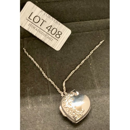 408 - A SILVER HEART SHAPED PENDANT ON SILVER CHAIN AND A PAIR OF SILVER DROP EARRINGS