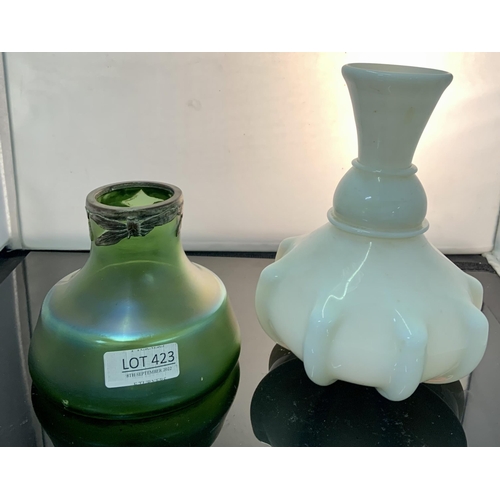 423 - A MILK GLASS VASE AND A GREEN IRRIDESCENT VASE WITH DRAGONFLIES TO RIM