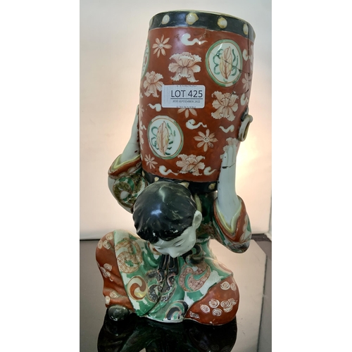 425 - CHINESE FIGURE OF A BOY HOLDING A BARRELL (HEAVILY REPAIRED)