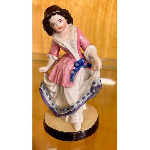 262 - AN ANTIQUE CONTINENTAL FIGURINE OF A GIRL DANCING - SIGNED TO BASE 1863