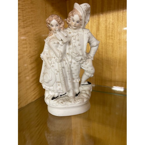 255 - AN ANTIQUE FRENCH BISQUE STYLE FIGURINE