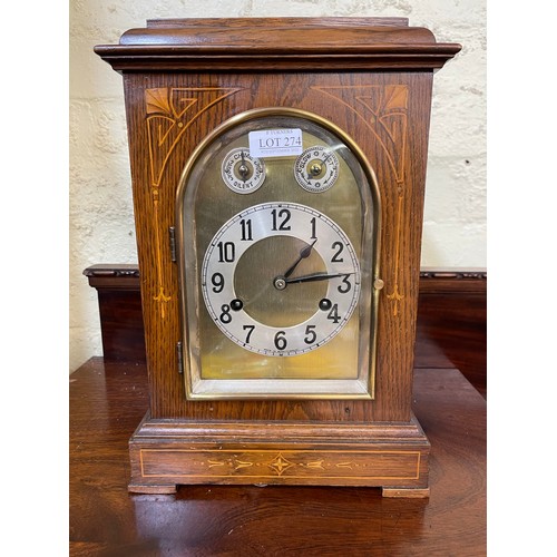 274 - AN INLAID OAK BRACKET CLOCK MARKED 'MADE IN WURTENBERG', BRASS ARCHED DOOR, SILENT/CHIME AND SLOW/FA... 