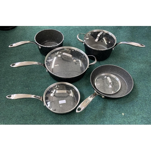 137 - 9 PIECE STARFRIT THE ROCK PAN SET - 5 PANS/4 LIDS - VERY SLIGHT USEAGE TO ONE PAN