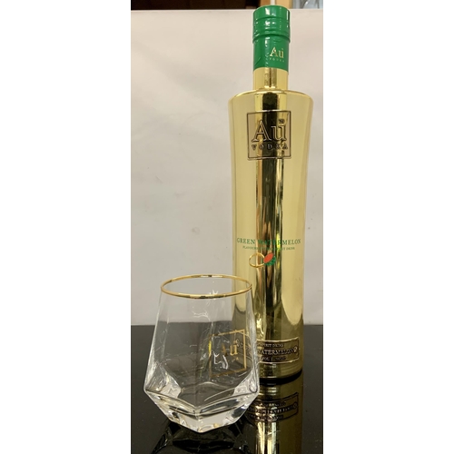 32 - BOTTLE OF AU VODKA GREEN WATERMELON 70CL TOGETHER WITH A COORDINATING AU GLASS