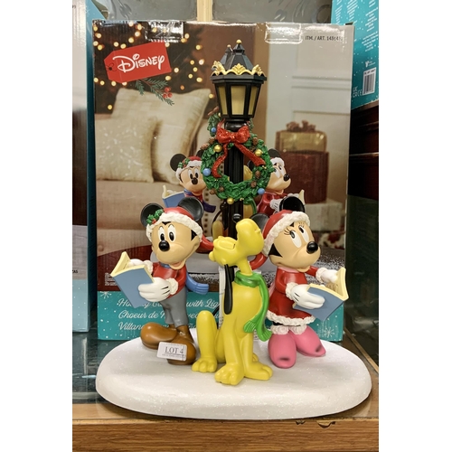 4 - BOXED DISNEY HOLIDAY CAROLERS WITH LIGHTS AND MUSIC SLIGHT REPAIR TO MICKEY