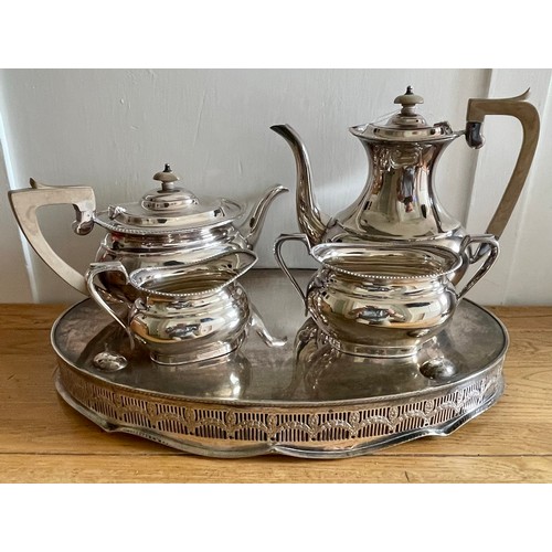 355 - E H PARKIN & CO SILVER PLATED TEA SET: TEA POT, COFFEE POT, CREAM & SUGAR ON AN OVAL CHASED TRAY BY ... 