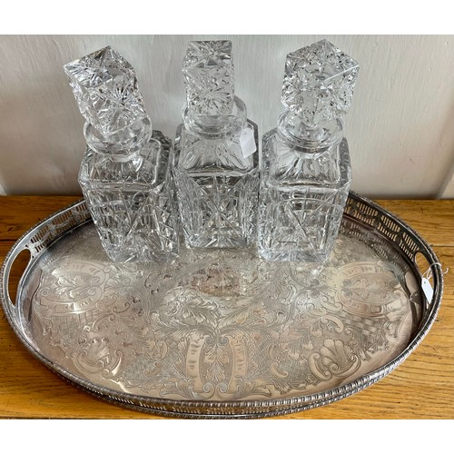 357 - 3X SQUARE LEAD CRYSTAL DECANTERS & STOPPERS ON AN ALPHA PLATED VINERS OF SHEFFIELD CHASED TRAY