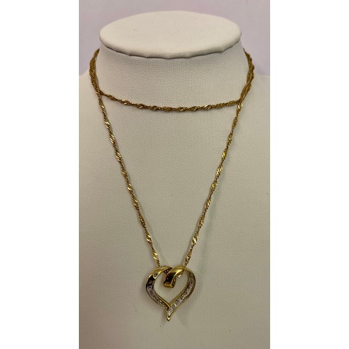 364 - 9CT GOLD HEART PENDANT SET WITH 20 DIAMONDS ON A 9CT GOLD CHAIN (20