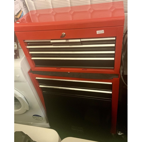 295 - A RED METAL 2 TIER WORKSTATION OF DRAWERS AND CUPBOARDS WITH OVER UNDER DOORS ON WHEELS WITH A VERY ... 