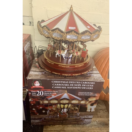 301 - BOXED CHRISTMAS DELUXE MUSICAL CAROUSEL - PLAYS 20 XMAS CAROLS