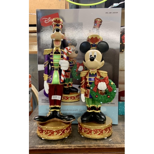 11 - BOXED DISNEY HOLIDAY NUTCRACKERS WITH LIGHTS AND MUSIC